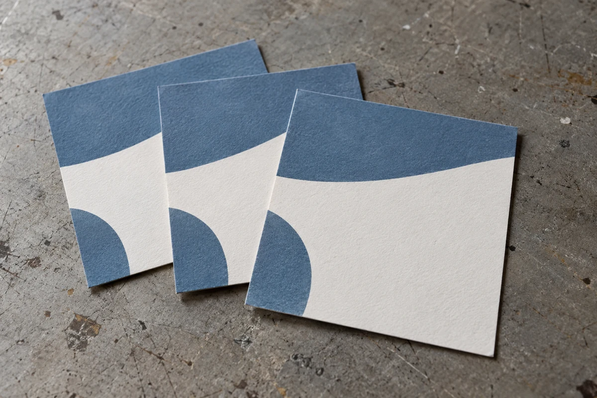 Illustration of campaign card proofs sharing a colored layout with a plain area reserved for changing content