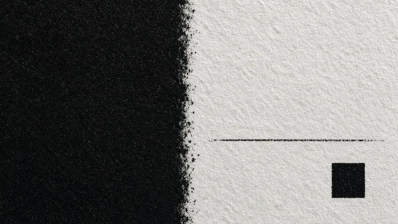 Macro view of heavy uncoated white paper grain beside a dense black ink block, a thin printed line, and a small solid square